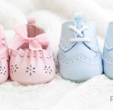 pink and blue baby shoes