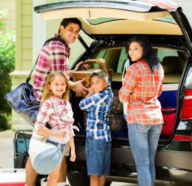 family packing up for a road trip